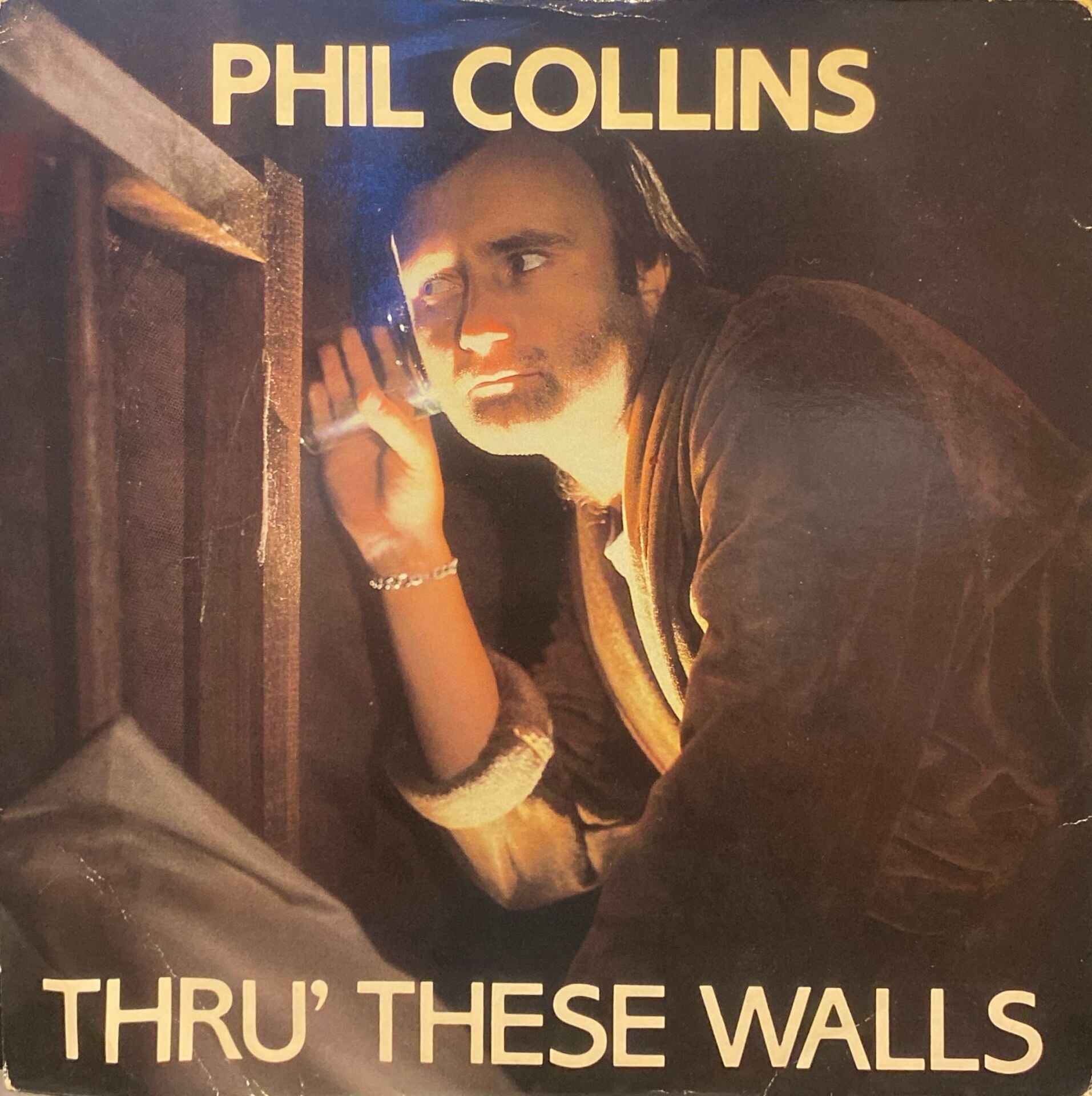Phil Collins – Thru' These Walls / Do You Know, Do You Care 45'lik