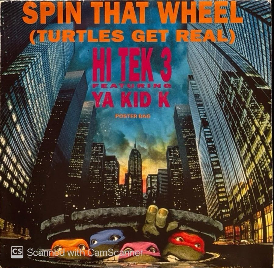 Hi Tek 3 Featuring Ya Kid K – Spin That Wheel (Turtles Get Real) (7'' Pizza Mix) / Spin That Wheel (Turtles Get Real) (7'' Pizza Dub Mix) 45'lik