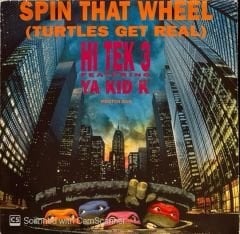 Hi Tek 3 Featuring Ya Kid K – Spin That Wheel (Turtles Get Real) (7'' Pizza Mix) / Spin That Wheel (Turtles Get Real) (7'' Pizza Dub Mix) 45'lik
